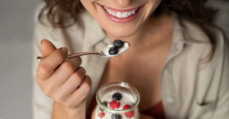 smiling woman yogurt.jpg